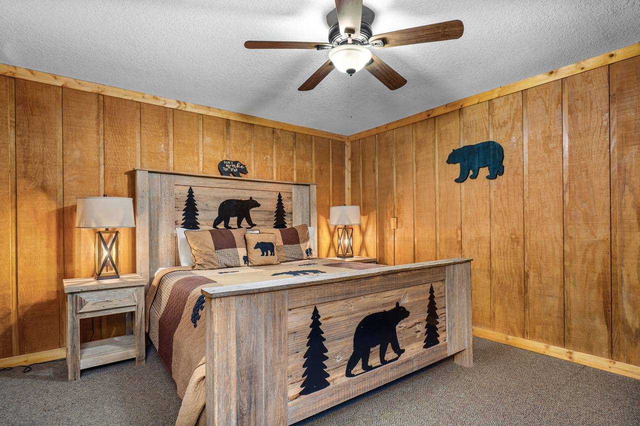 Cozy lower-level bedroom with plush king bed Cozy lower-level bedroom with plush king bed