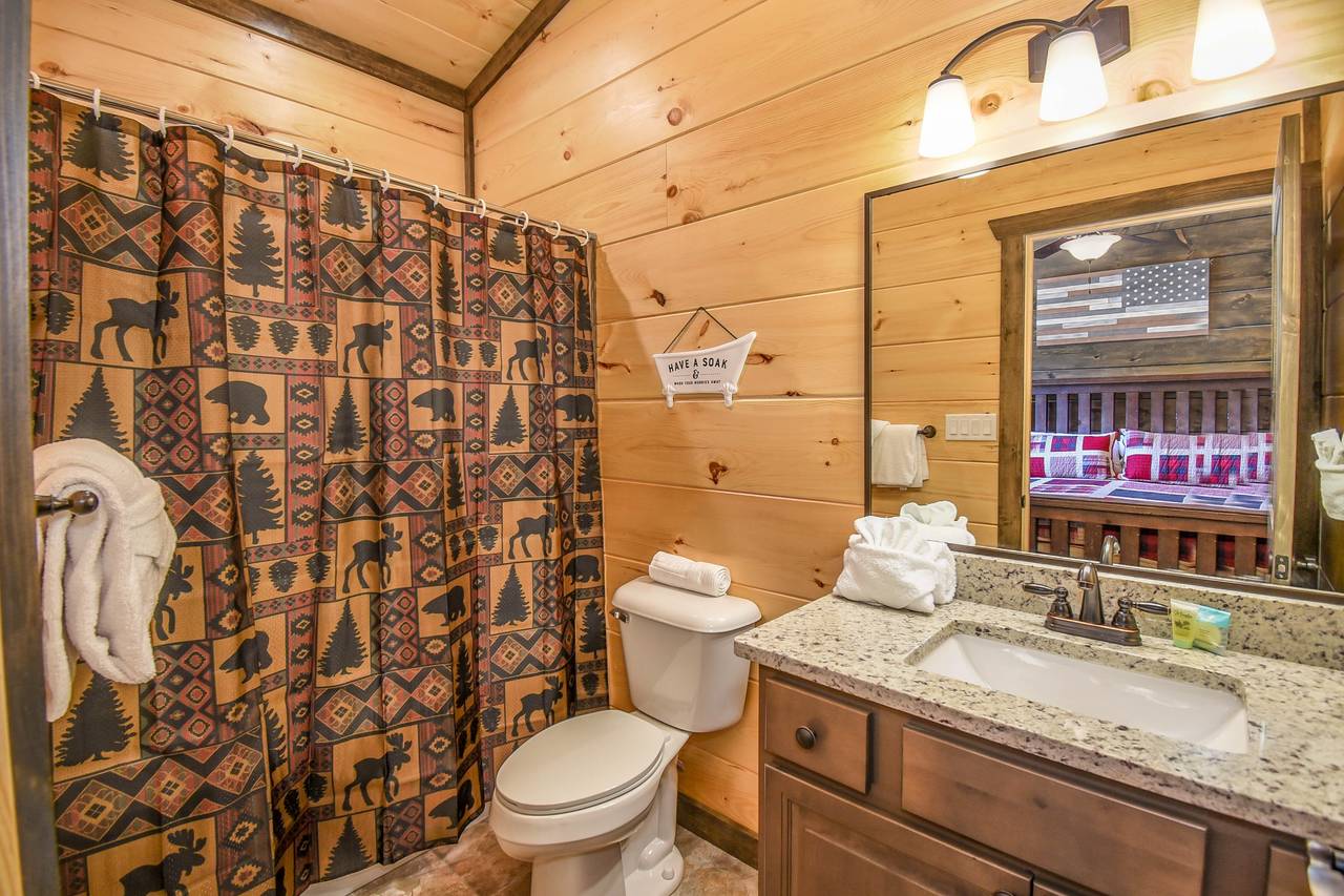 Upper-level en-suite bathroom with convenience and privacy Upper-level en-suite bathroom with convenience and privacy