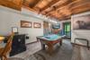 Lower level game room with bunk bed, pool table, & arcade Lower level game room with bunk bed, pool table, & arcade