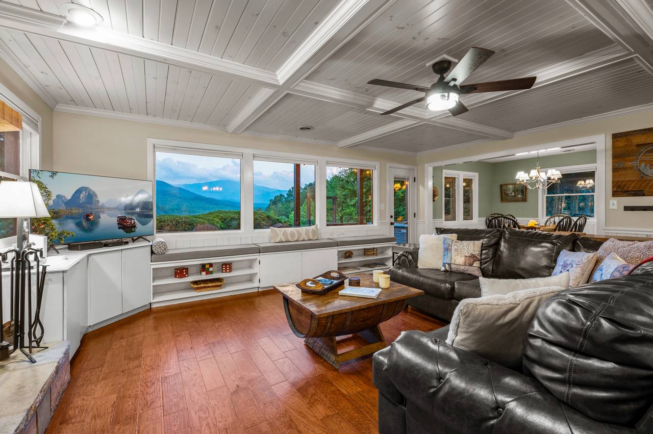 Living room with TV, views of the Smokies, and comfy seating! Living room with TV, views of the Smokies, and comfy seating!