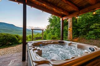 Soak your troubles away in the private hot tub. Soak your troubles away in the private hot tub.