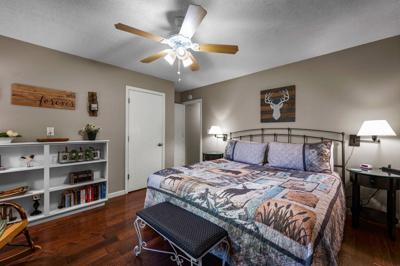 Bed 3: upper level king bed with rocking chair and TV Bed 3: upper level king bed with rocking chair and TV