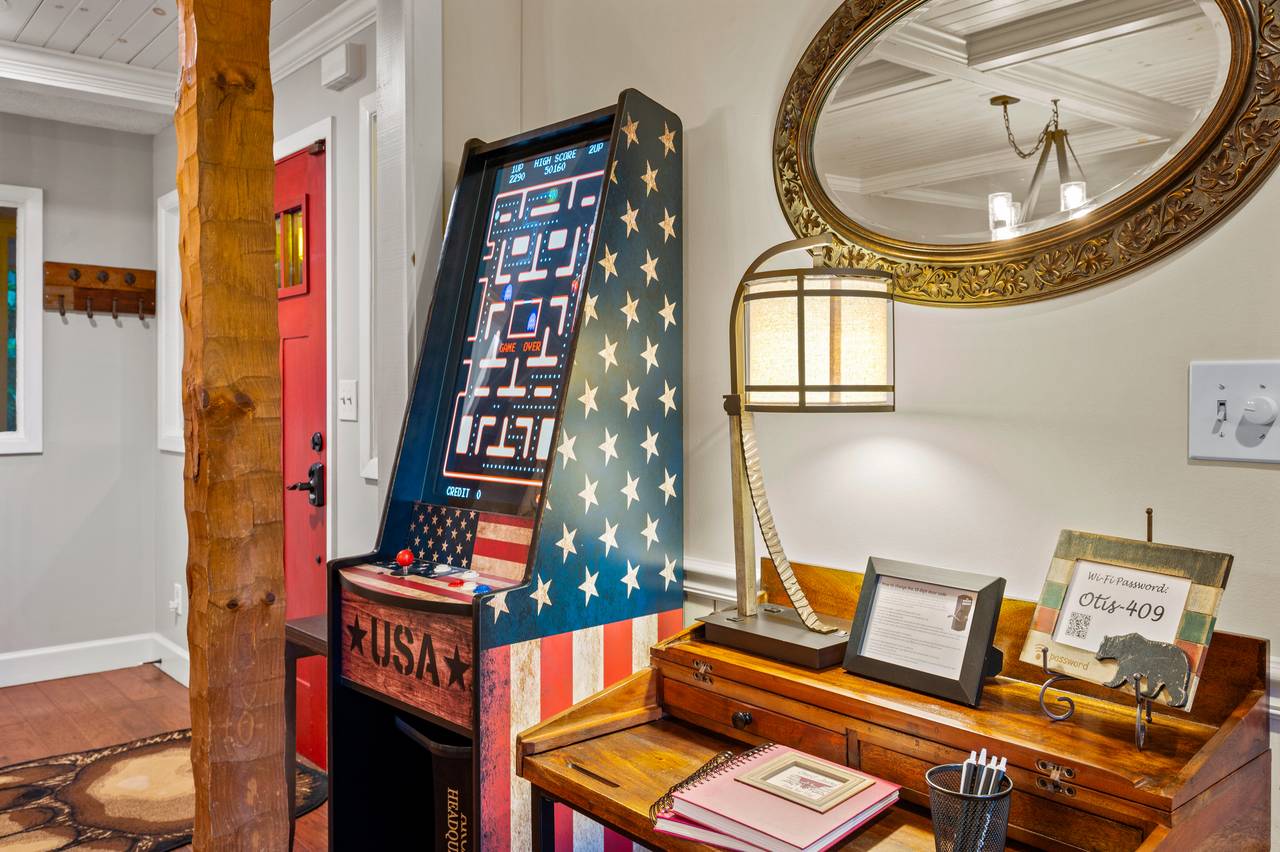 Multi-cade arcade game and remote work station Multi-cade arcade game and remote work station