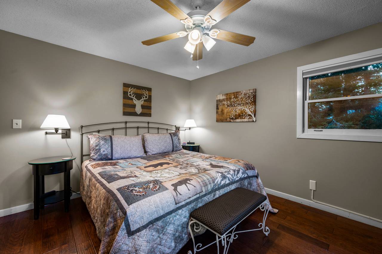 Bed 3: upper level king bed with rocking chair and TV Bed 3: upper level king bed with rocking chair and TV