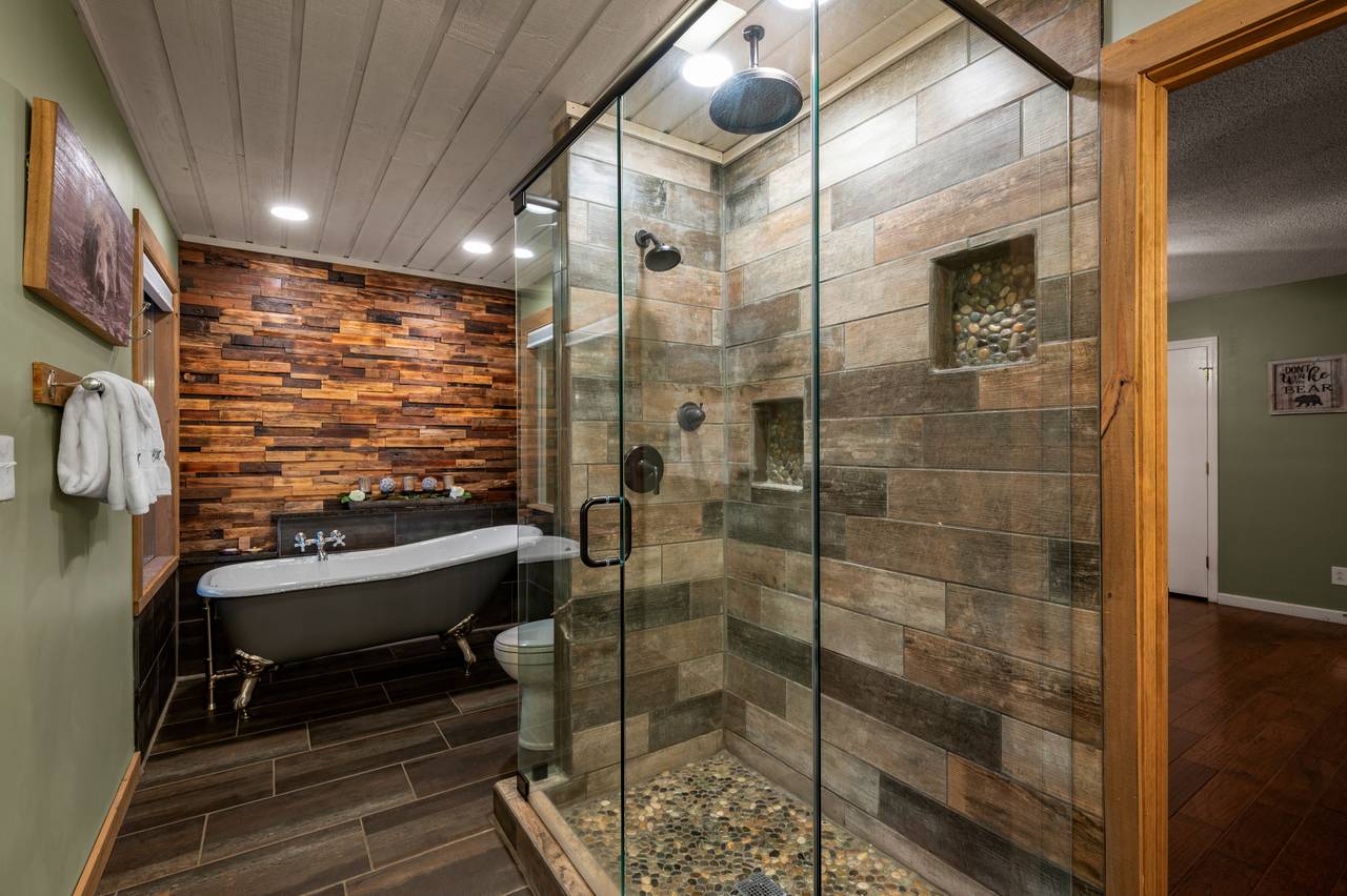 Bath 1: Upper king ensuite with standing shower and claw tub Bath 1: Upper king ensuite with standing shower and claw tub