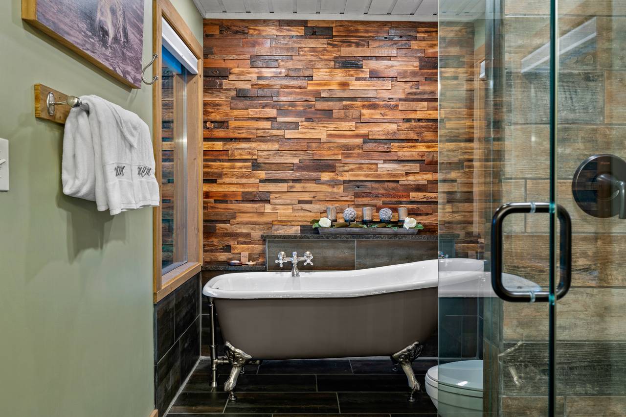 Bath 1: Upper king ensuite with standing shower and claw tub Bath 1: Upper king ensuite with standing shower and claw tub