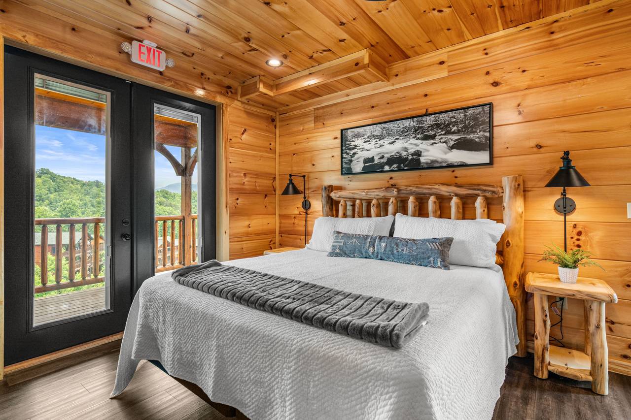 Main floor king bedroom with private ensuite bath Main floor king bedroom with private ensuite bath