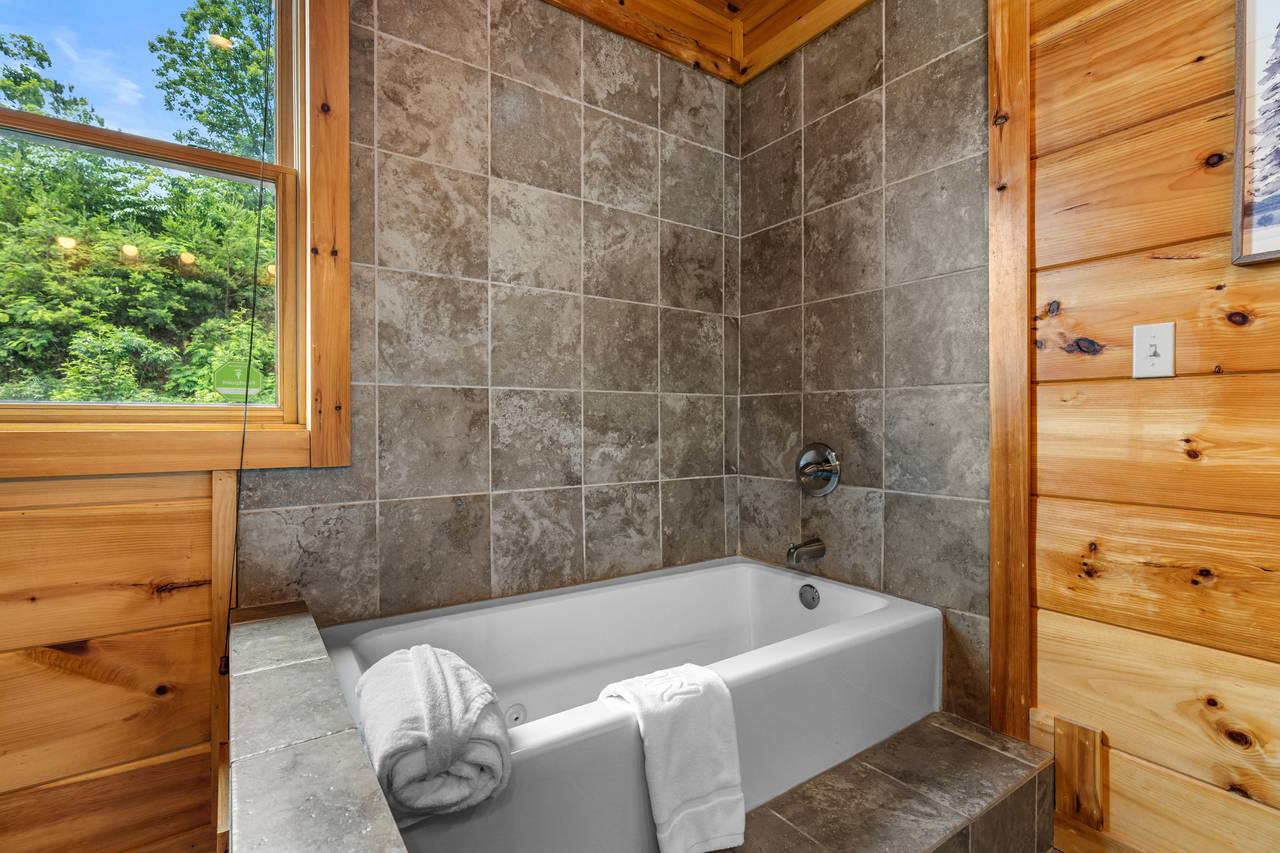 Ensuite bath with jetted tub & walk-in shower Ensuite bath with jetted tub & walk-in shower