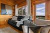 Lower-level lounge with big-screen & wet bar Lower-level lounge with big-screen & wet bar