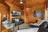 Lower-level lounge with big-screen & wet bar Lower-level lounge with big-screen & wet bar
