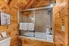 Upper level ensuite full bath with jetted tub and shower combo Upper level ensuite full bath with jetted tub and shower combo