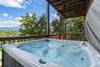 Relaxing 6-person hot tub with scenic backdrop Relaxing 6-person hot tub with scenic backdrop