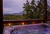 Relaxing 6-person hot tub with scenic backdrop Relaxing 6-person hot tub with scenic backdrop