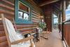 Rocking chairs facing breathtaking mountain scenery Rocking chairs facing breathtaking mountain scenery