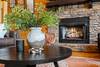 Cozy living room with fireplace & soaring ceilings Cozy living room with fireplace & soaring ceilings