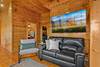 Lower-level lounge with big-screen & wet bar Lower-level lounge with big-screen & wet bar
