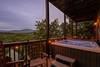 Relaxing 6-person hot tub with scenic backdrop Relaxing 6-person hot tub with scenic backdrop