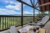 Rocking chairs facing breathtaking mountain scenery Rocking chairs facing breathtaking mountain scenery