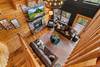 Cozy living room with fireplace & soaring ceilings Cozy living room with fireplace & soaring ceilings