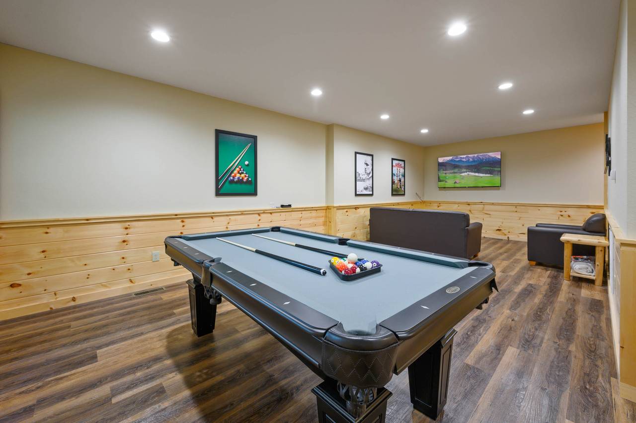 Lower level game room: Multi-Cade Arcade & Pool Table Lower level game room: Multi-Cade Arcade & Pool Table