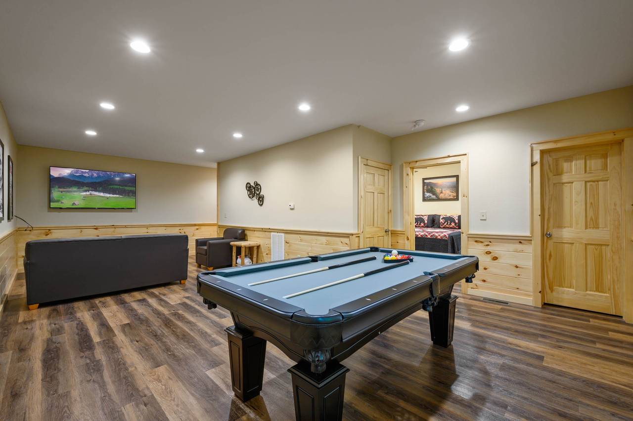 Lower level game room: Multi-Cade Arcade & Pool Table Lower level game room: Multi-Cade Arcade & Pool Table
