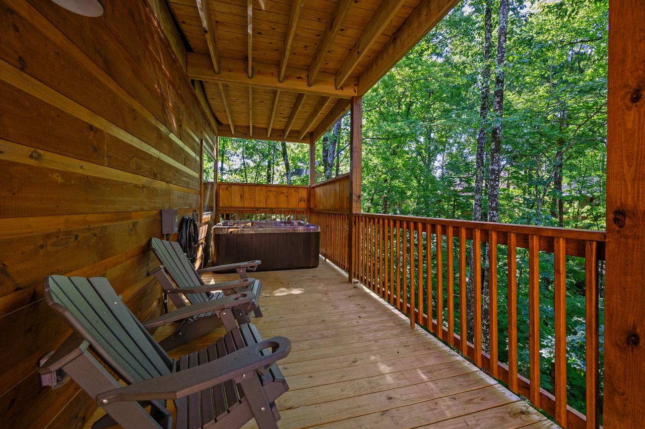 Outdoor deck seating and private hot tub Outdoor deck seating and private hot tub