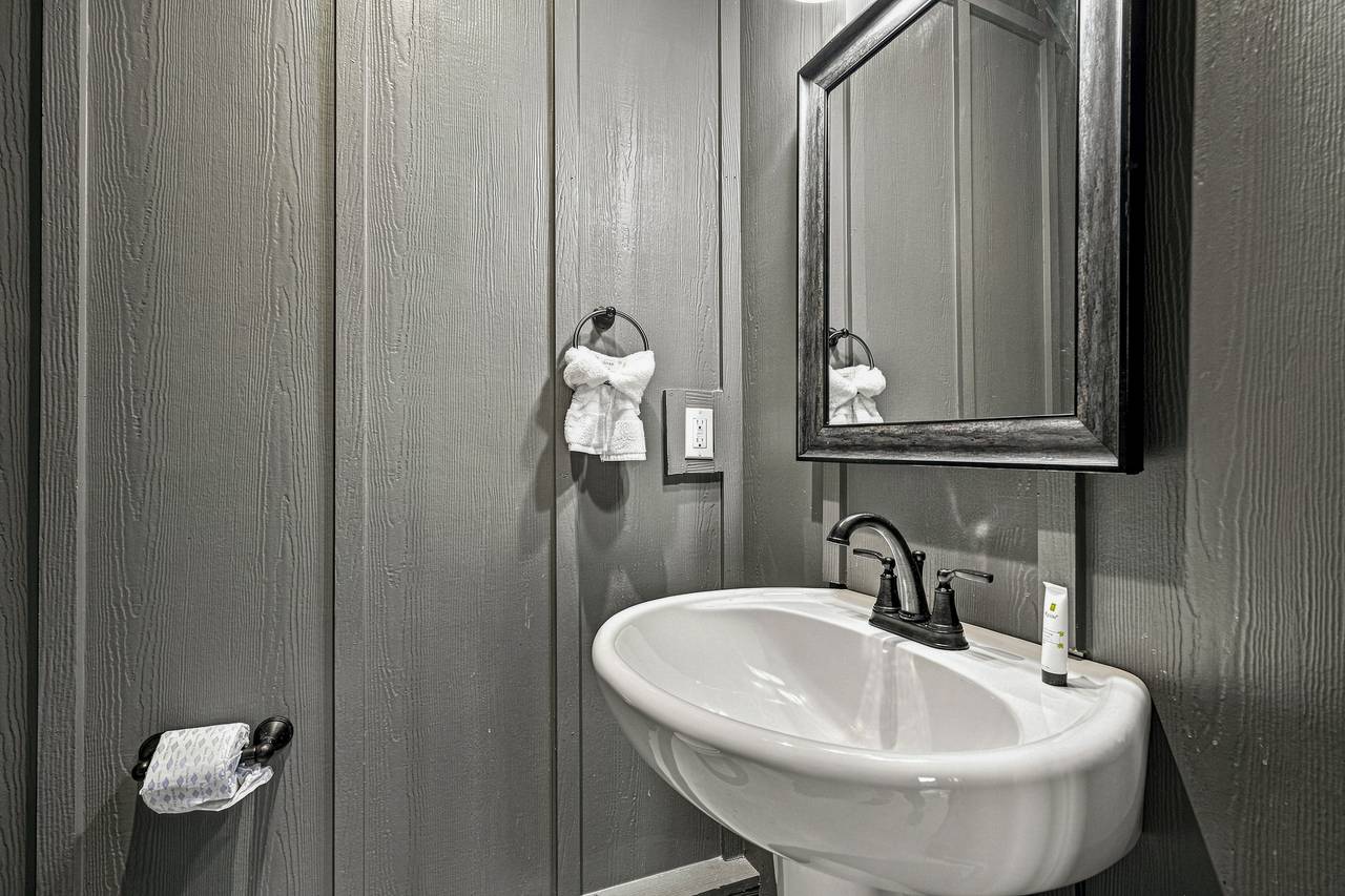 Half bathroom is conveniently located near the pool. Half bathroom is conveniently located near the pool.