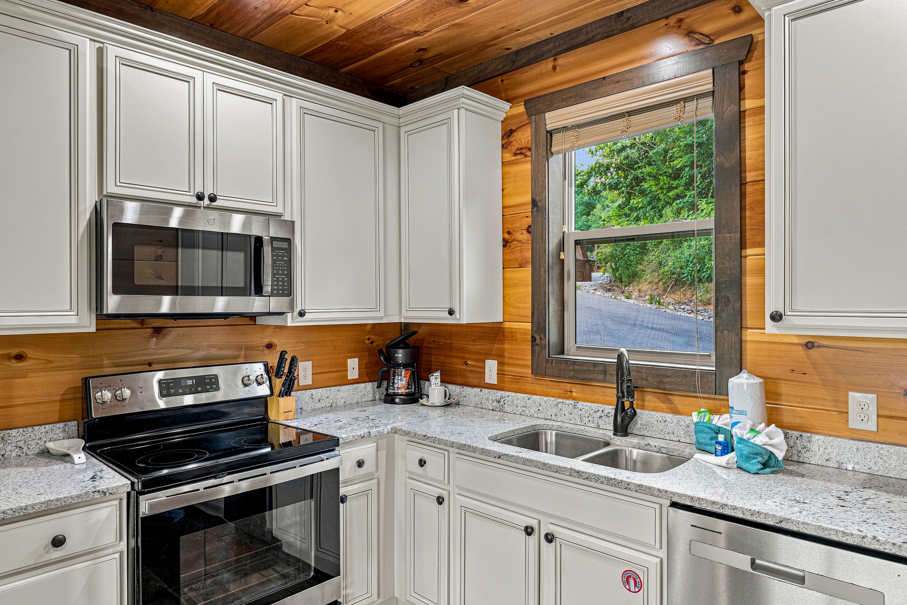 Fully equipped kitchen with stainless-steel appliances.
