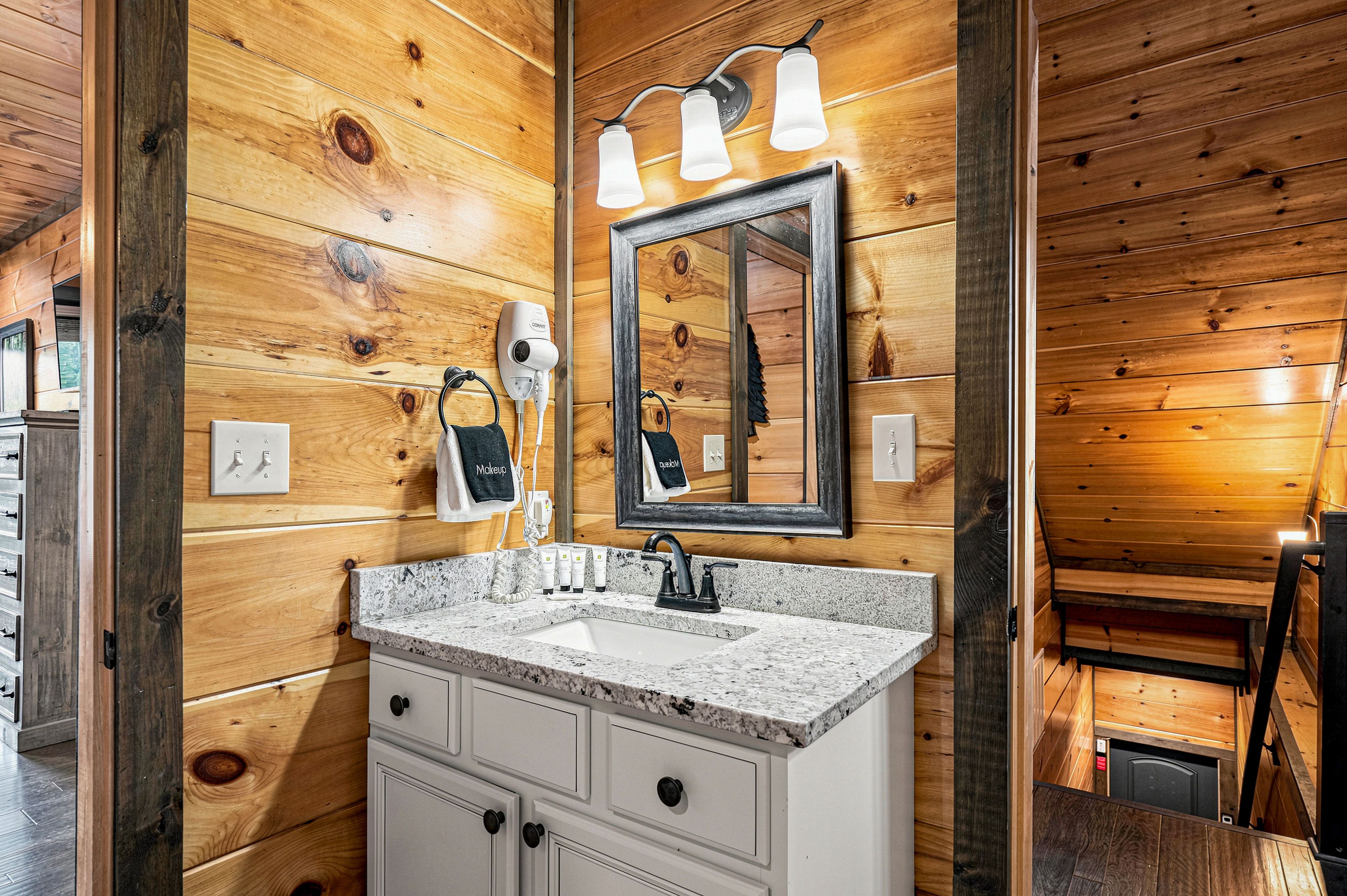 Private en-suite bathroom connected to the main-level suite.