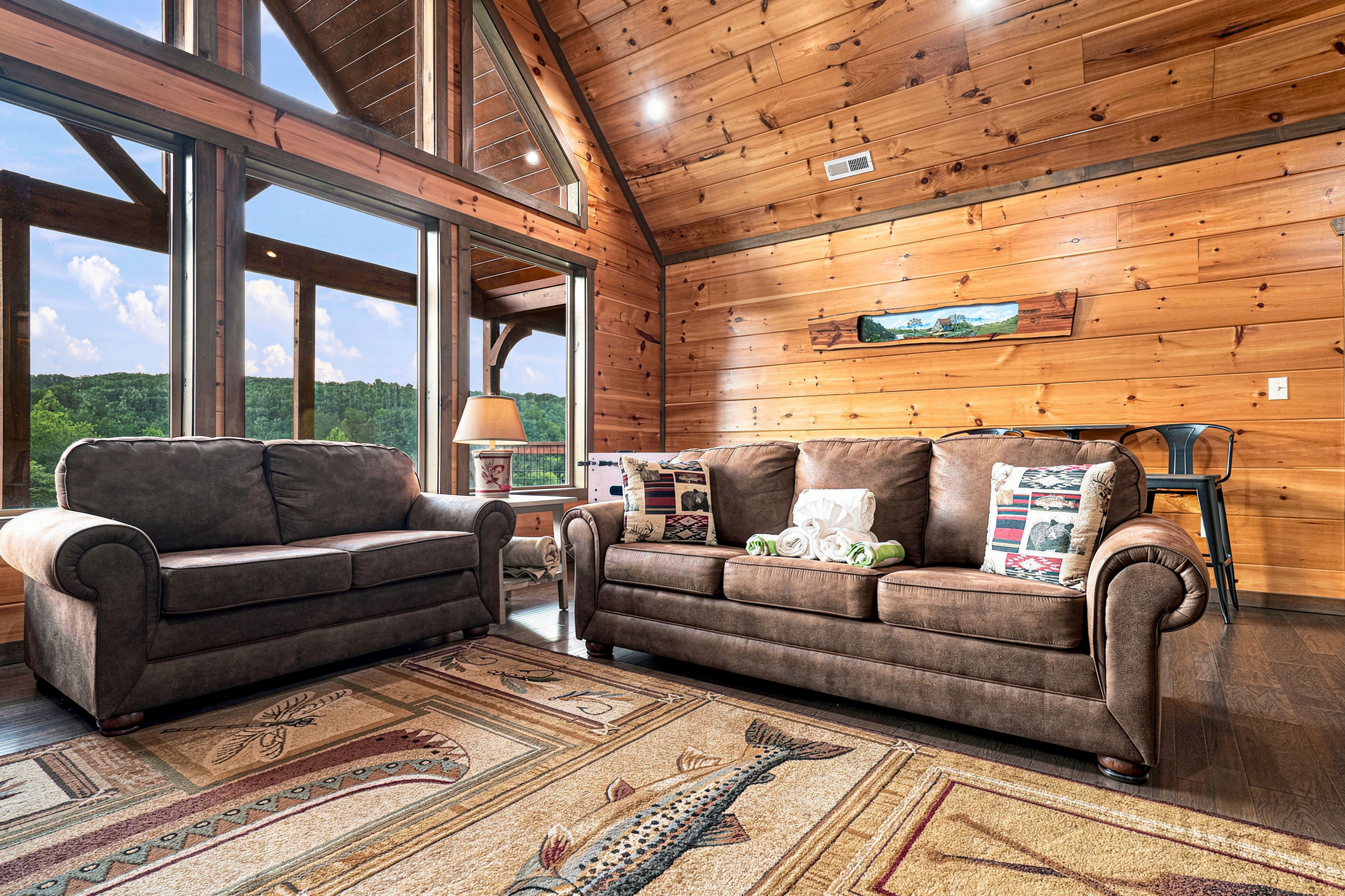 Queen sleeper sofa and loveseat offer comfortable seating.