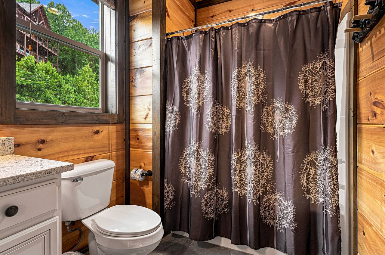 Upper-level king suite with a private en-suite bathroom. Upper-level king suite with a private en-suite bathroom.