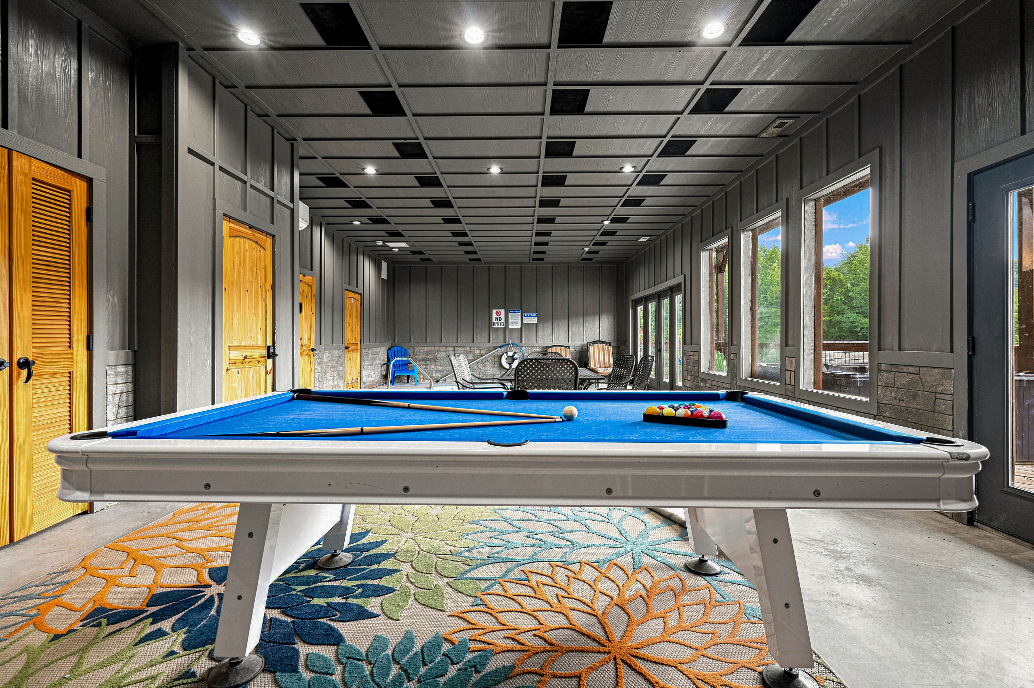 Challenge family and friends to a game of pool.
