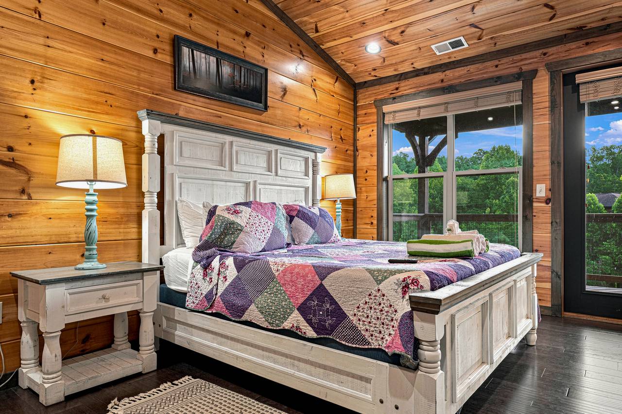 Upper-level king suite with a private en-suite bathroom. Upper-level king suite with a private en-suite bathroom.