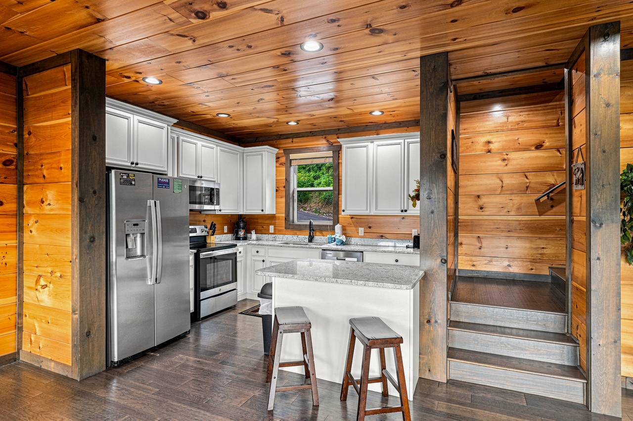 Bar seating for two at the kitchen island. Bar seating for two at the kitchen island.