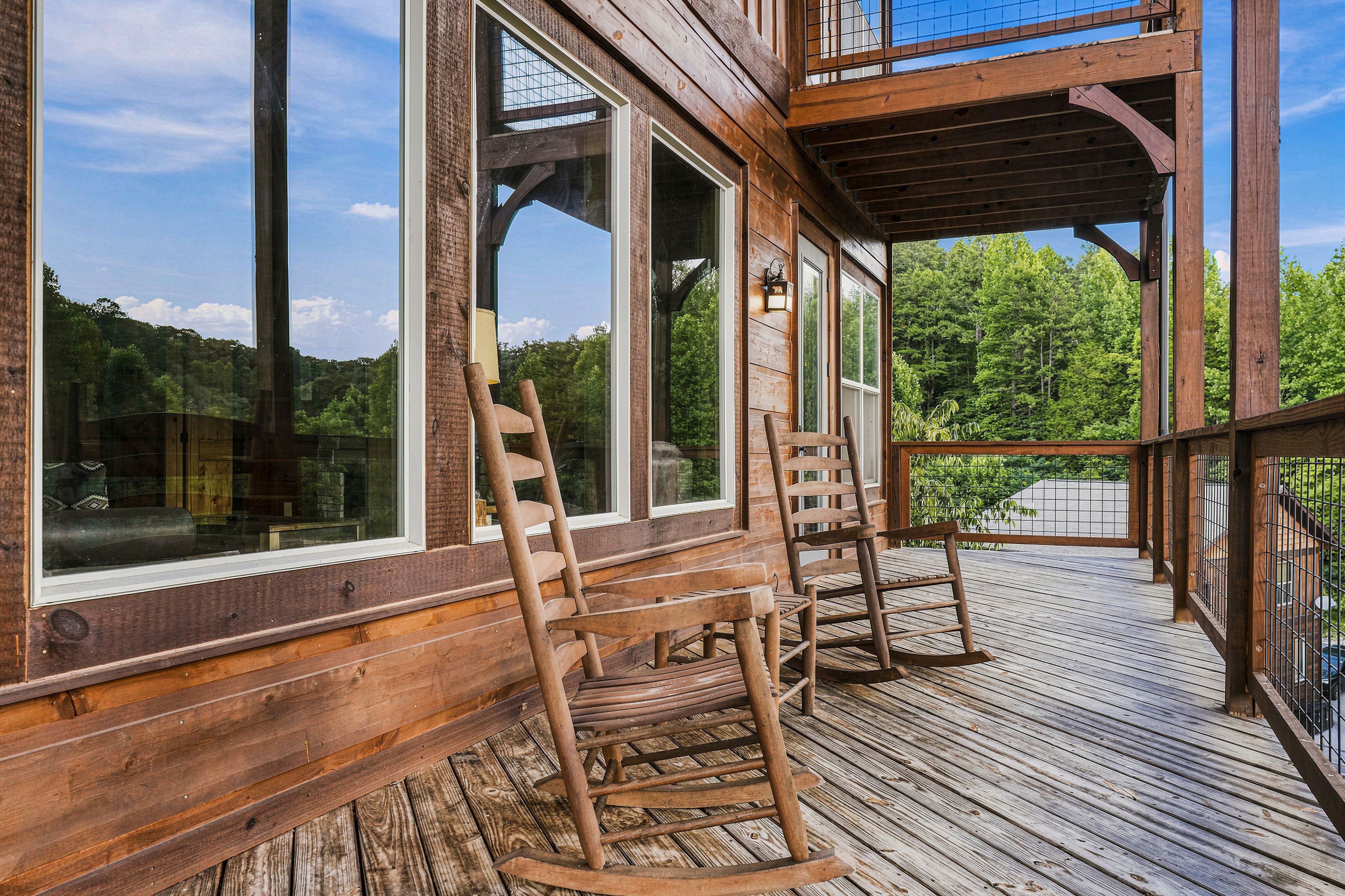 Unwind in the rocking chairs on the cabin’s private decks.