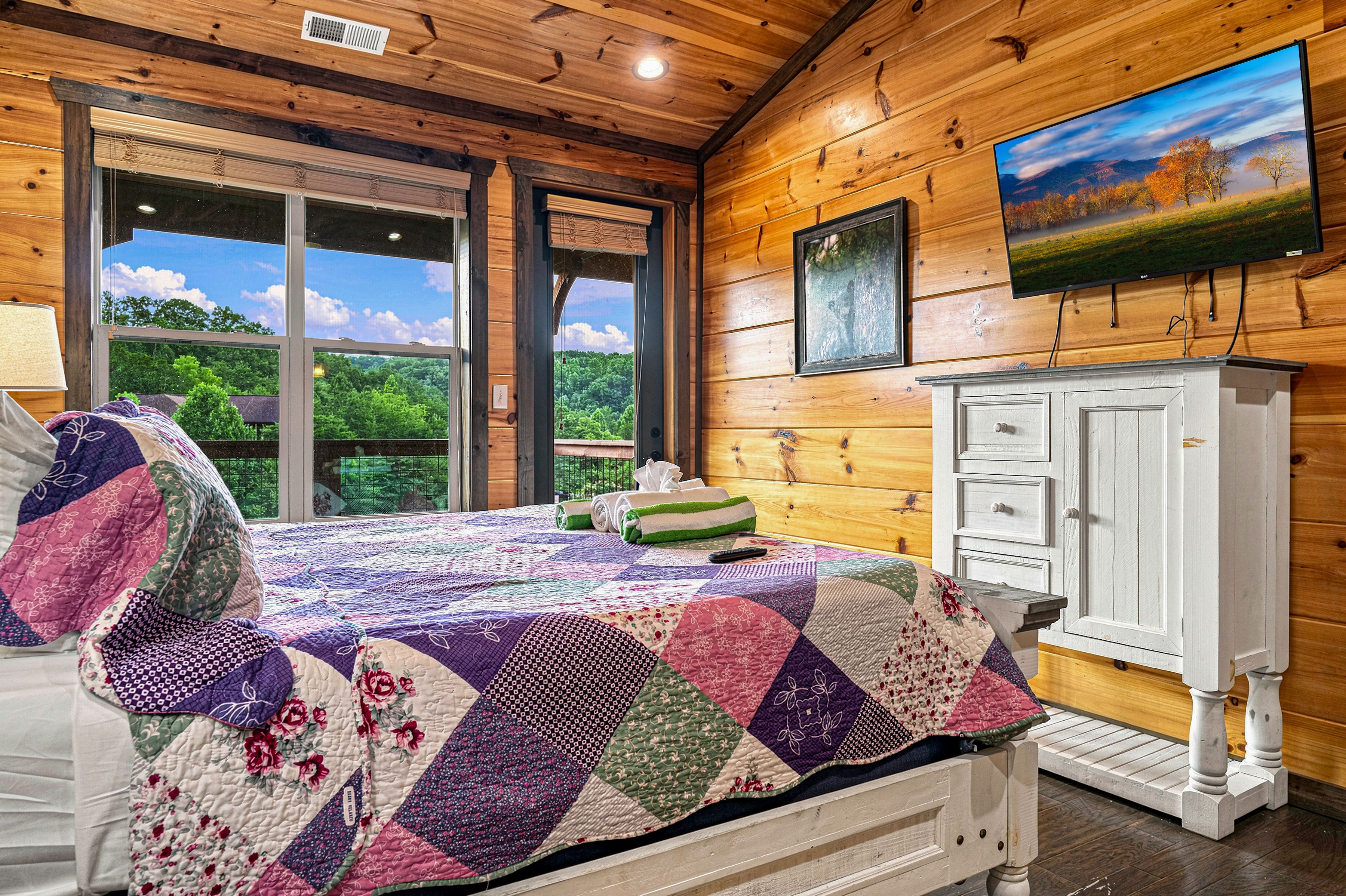 Upper-level king suite with a private en-suite bathroom.