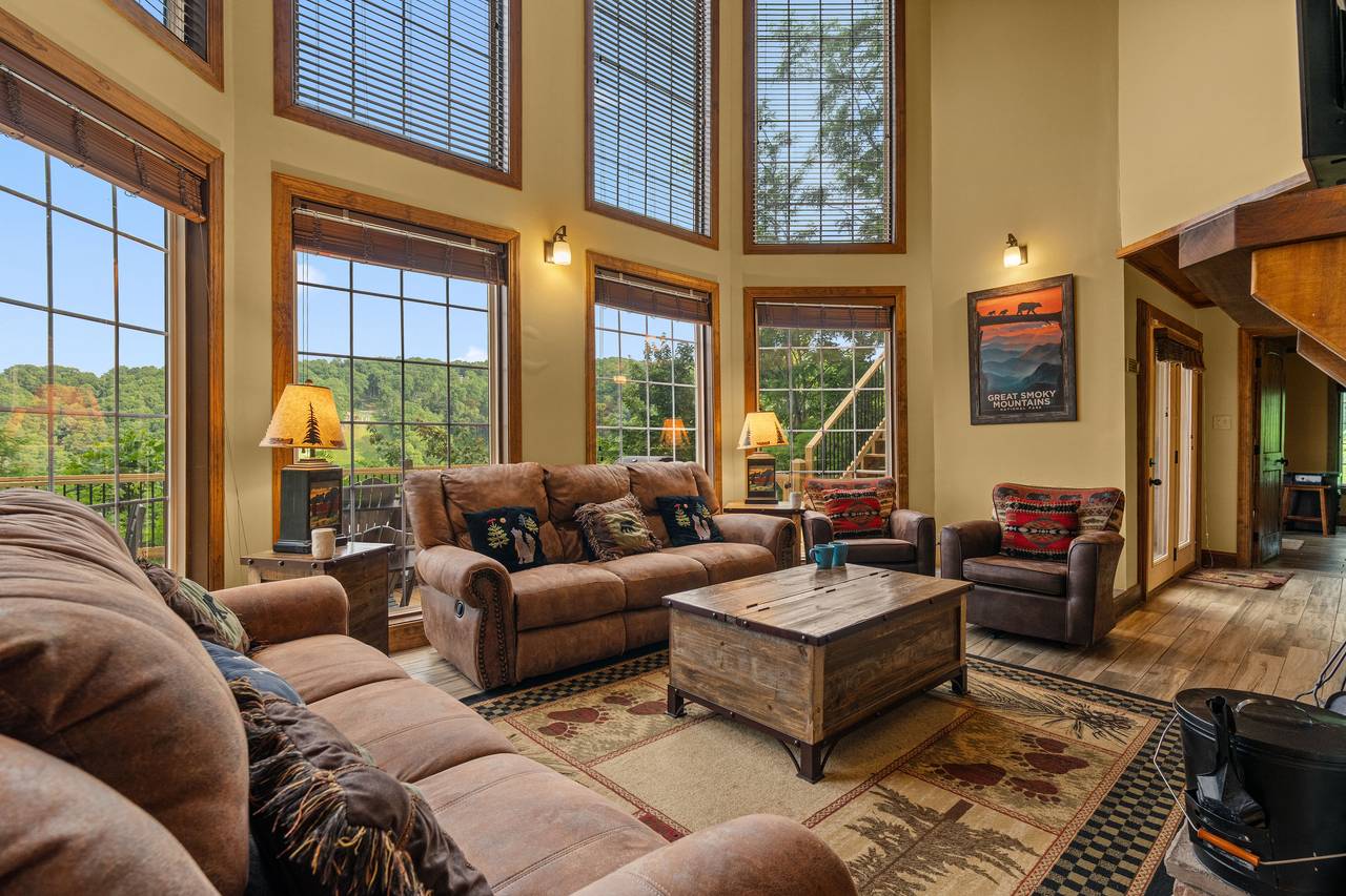 Cozy living room w/ recliners & wood-burning fireplace Cozy living room w/ recliners & wood-burning fireplace