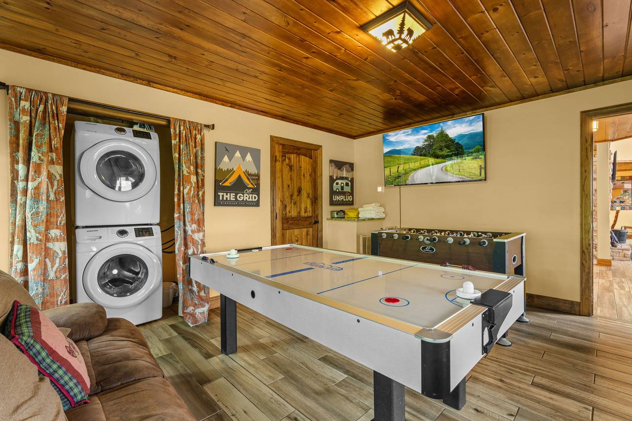 Game room w/ air hockey, arcade & new foosball table Game room w/ air hockey, arcade & new foosball table