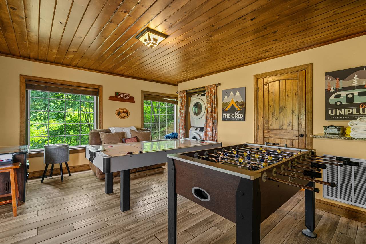 Game room w/ air hockey, arcade & new foosball table Game room w/ air hockey, arcade & new foosball table