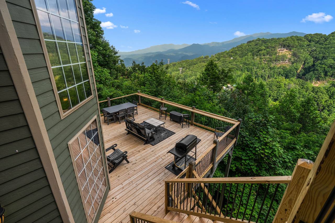 Two-tier deck w/ new furniture & stunning mountain views Two-tier deck w/ new furniture & stunning mountain views