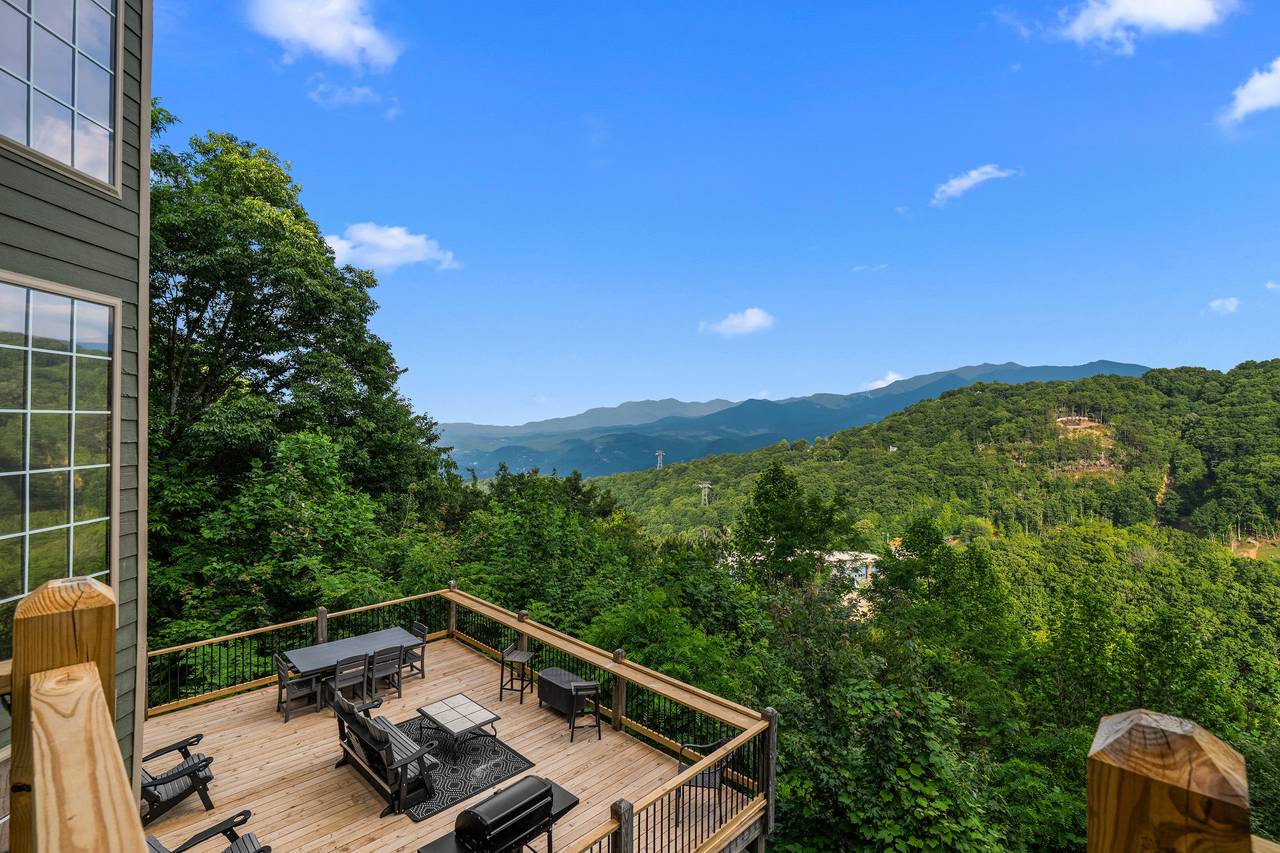Two-tier deck w/ new furniture & stunning mountain views Two-tier deck w/ new furniture & stunning mountain views