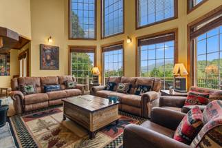 Cozy living room w/ recliners & wood-burning fireplace Cozy living room w/ recliners & wood-burning fireplace