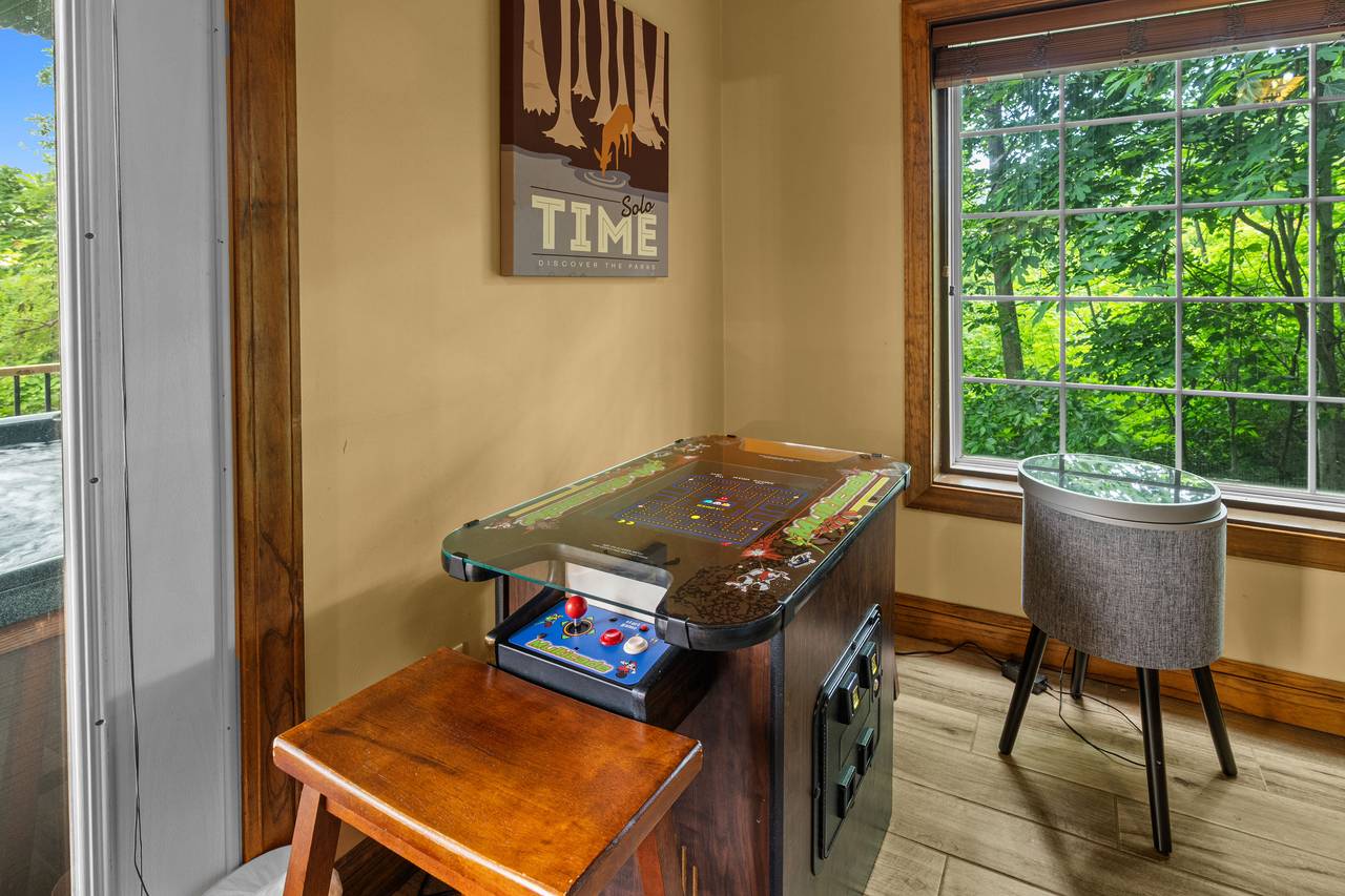 Game room w/ air hockey, arcade & new foosball table Game room w/ air hockey, arcade & new foosball table