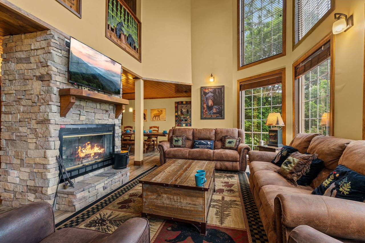 Cozy living room w/ recliners & wood-burning fireplace Cozy living room w/ recliners & wood-burning fireplace