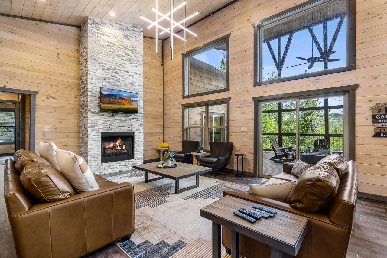 Spacious Living Room with Fireplace & Large HDTV Spacious Living Room with Fireplace & Large HDTV