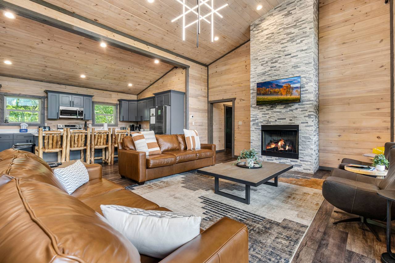 Spacious Living Room with Fireplace & Large HDTV Spacious Living Room with Fireplace & Large HDTV