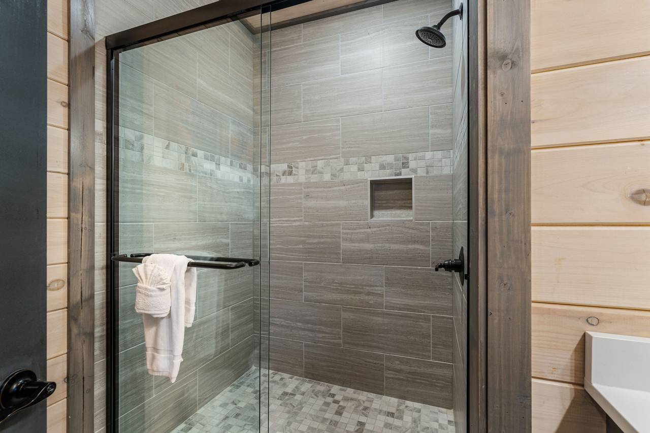 Lower level full bath with standing shower Lower level full bath with standing shower