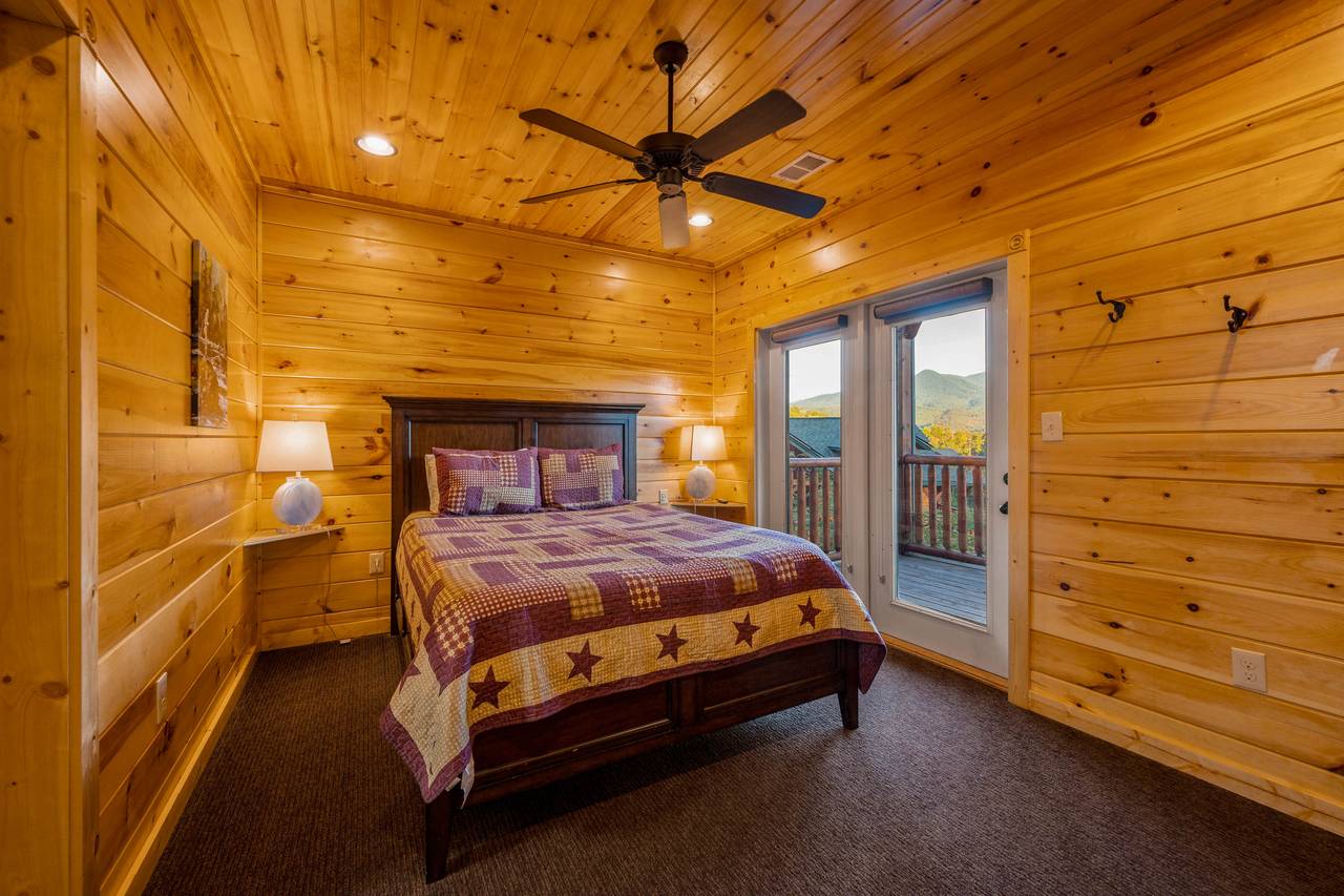 Bed 5: Lower level, queen, TV, deck entrance, ensuite full bath Bed 5: Lower level, queen, TV, deck entrance, ensuite full bath
