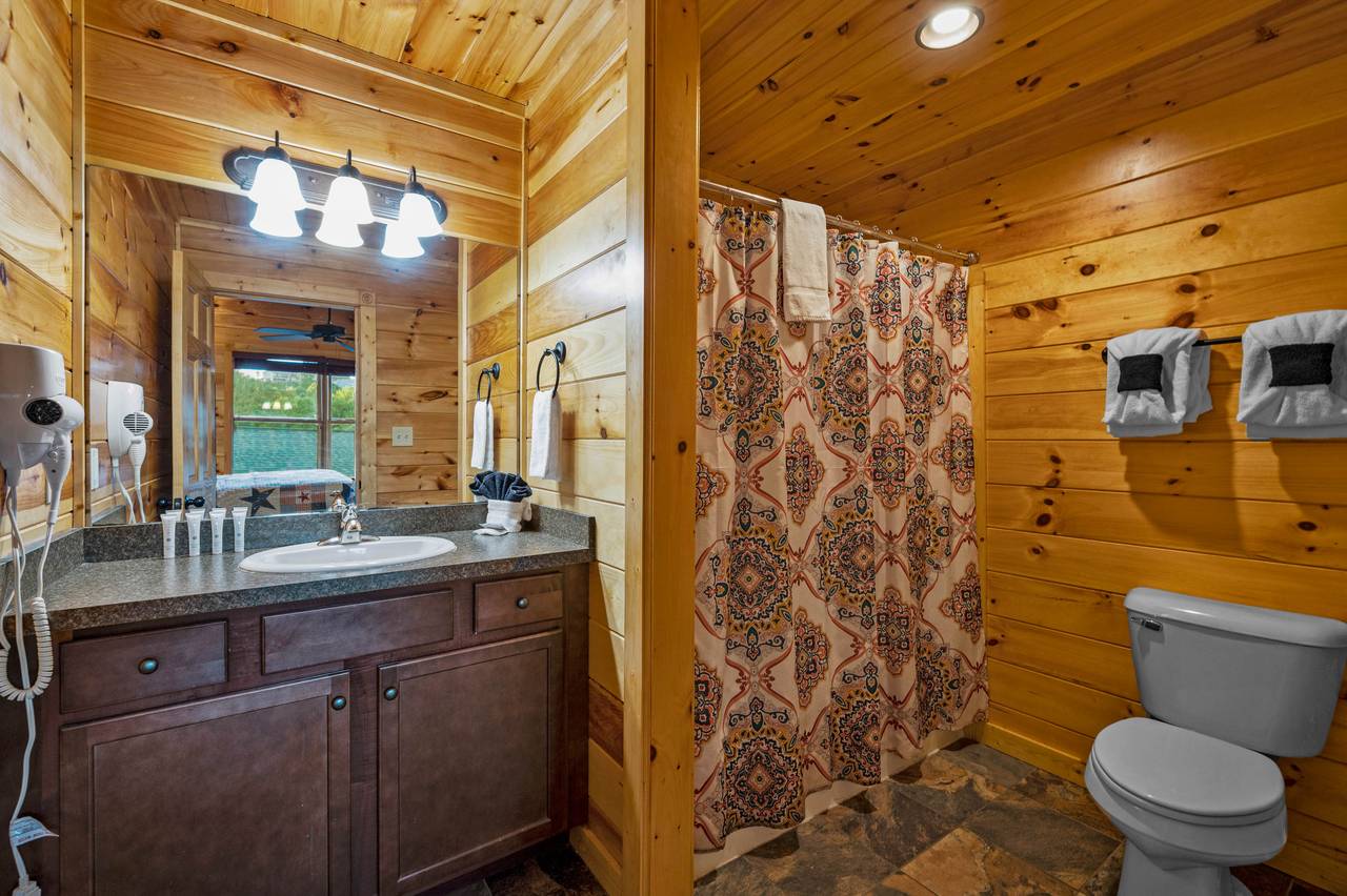 Bed 1: full ensuite bathroom with tub shower combo Bed 1: full ensuite bathroom with tub shower combo