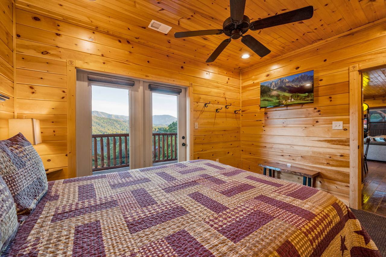 Bed 5: Lower level, queen, TV, deck entrance, ensuite full bath Bed 5: Lower level, queen, TV, deck entrance, ensuite full bath